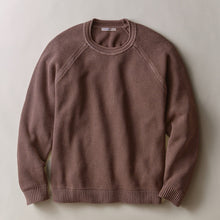 Load image into Gallery viewer, A dusty rose brown crewneck sweater with raglan sleeves, laid flat against a neutral light beige background.
